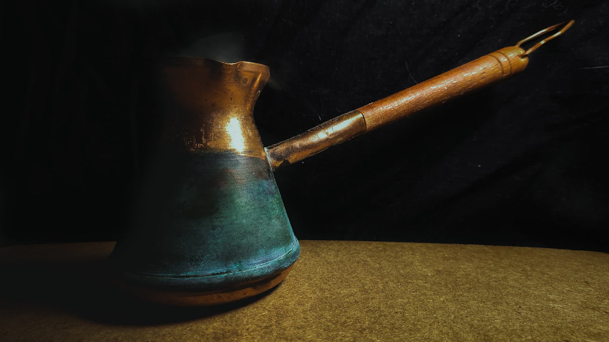 A grey cezve, the long handled pot used for Turkish coffee